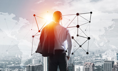 Concept of business success and control with confident boss against cityscape background
