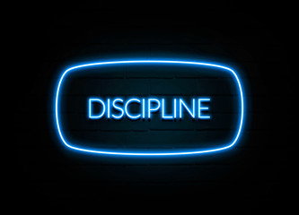 Discipline  - colorful Neon Sign on brickwall