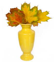 Vase with yellow leaves