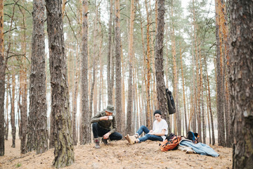 Men travelers outdoor. Travel lifestyle and adventure concept.