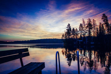  Blue, orange sunset reflecting on the lake