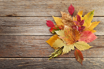 Autumn leafs on grey wooden table