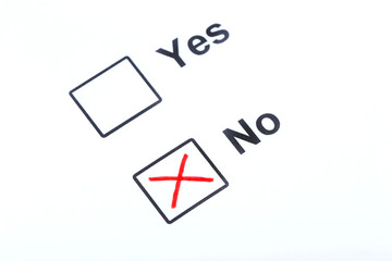Check boxes yes and no on white paper
