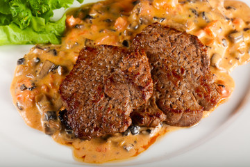 Beef with mushroom sauce