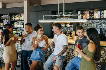 People drinking in bar