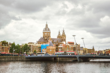 Amsterdam canal and Basilica of St. Nicholas