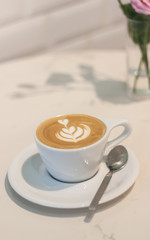 Hot coffee latte.Served in white ceramic coffee mug