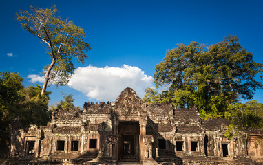 Fototapeta premium Angkor Wat Temple in Cambodia is the largest religious monument in the world and a World heritage listed complex, inscribed on the UNESCO World Heritage List in 1992. Ancient Khmer architecture