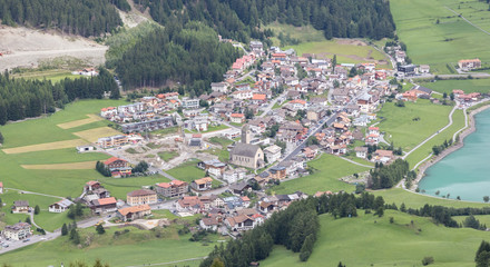 Beautiful view on the village of Reshen, the Alps