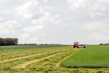 Mechanized mowing grass