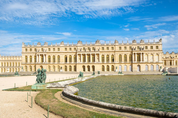 Fototapeta na wymiar The royal Palace of Versailles near Paris on a beautiful summer day