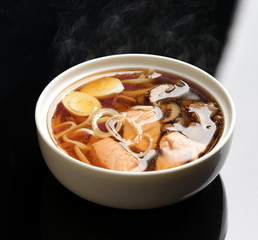 Seafood miso soup with salmon calamary and mashrooms 