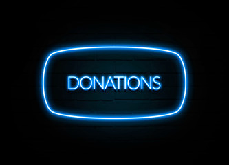 Donations  - colorful Neon Sign on brickwall