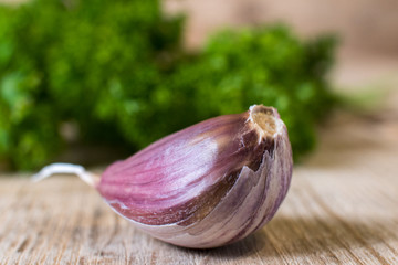Fresh garlic on a wooden background