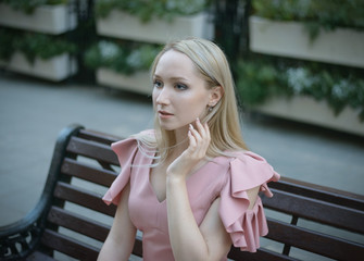 Outdoors portrait of beautiful young woman. Selective focus.