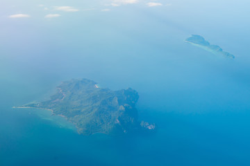 Fototapeta na wymiar Aerial view of the tropical islands in blue sea water