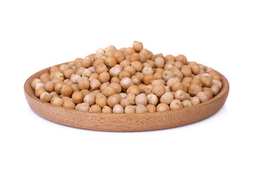chick-pea in wood plate isolated on white background