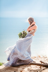 Fototapeta na wymiar couple in love celebrating a wedding on the ocean