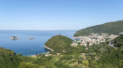 Aerial view of Lucice sandy beach and small town Petrovac in Montenegro