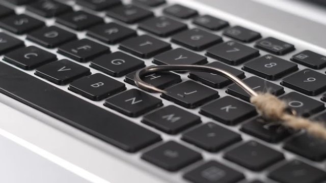 Illustration, on fishhook Compucter keyboard