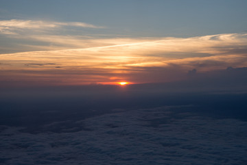 Fototapeta na wymiar Beautiful view of the sunset from the airplane