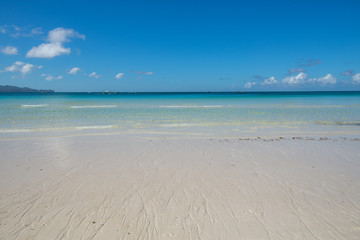 Fototapeta na wymiar Empty beach with a clear blue sky. 