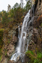 Fototapeta na wymiar great cascading waterfall in a mountainous area