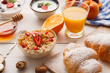 Continental breakfast menu on woden table