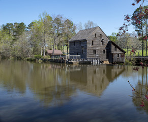 Fototapeta na wymiar Mill overlooking pond