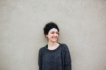 Facial expression of a young caucasian woman: smiling