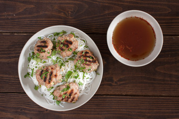 thai patties with lemongrass, rice noodles, hot sauce