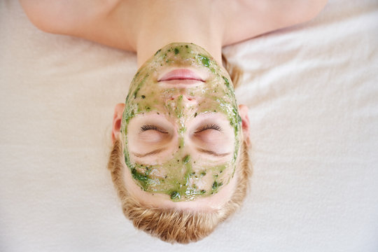 Woman receiving all natural facial at luxury spa