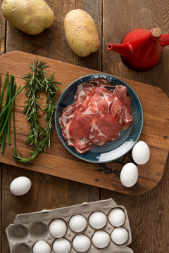 Breakfast: Ingredients for Baked Eggs on Coppa and Hash Browns