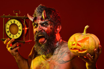 Halloween satan with beard, wounds, blood, tattoo on chest