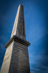 Egyptian Luxor obelisk with hieroglyphics. Place de la Concorde. Paris, France.
