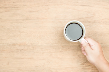 hand hold coffee cup