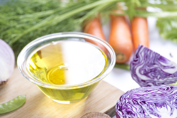Olive oil and fresh vegetables. Healthy lifestyle.
