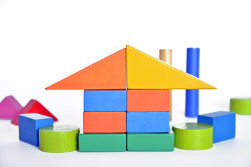 wooden constructions for children play  wooden colored blocks, construction game,   part of a series, closeup
