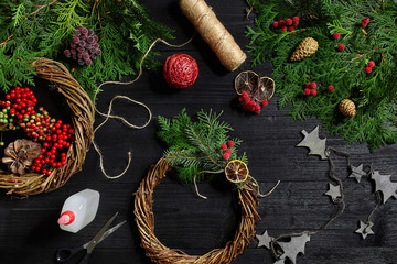 Manufacturer of Christmas decor with their own hands. Christmas wreath for the holiday. The new...