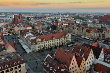 Fototapeta na wymiar Wroclaw skyline with beautiful colorful historical houses of the Old Town, aerial view from the viewing terrace of the Saint Elizabeth Church
