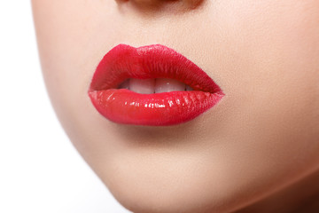 Make-up artist apply lipstick with brush, beauty
