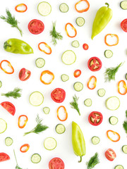 Composition of fresh vegetables. Tomatoes slices, red and green peppers, dill, isolated on white background. Top view, flat lay. Wallpaper of a vegetable pattern.
