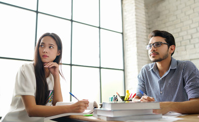 Asian students are tutoring Review the class in Library.