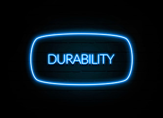 Durability  - colorful Neon Sign on brickwall
