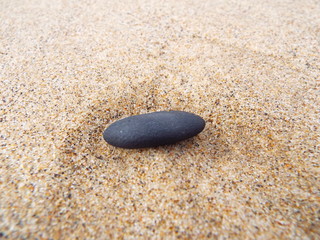 Fototapeta na wymiar coal on a beach