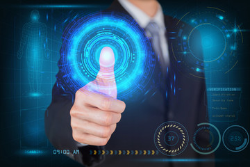 Businessman give a thumbs up for scanning finger security futuristic hi-tech as technology and innovation concept.