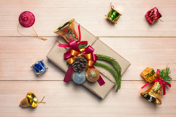 Gift box and new year decoration on wood plate.Flat lay.Christmas and New year concept.