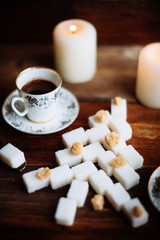 christmas tree made from green ribbon on wooden background.