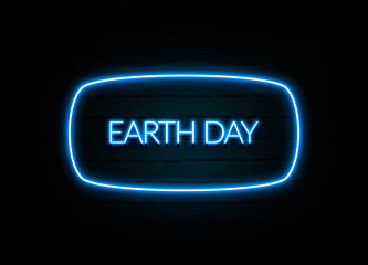 Earth Day  - colorful Neon Sign on brickwall