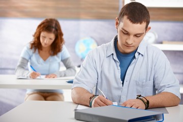 Fototapeta premium Students studying in classroom